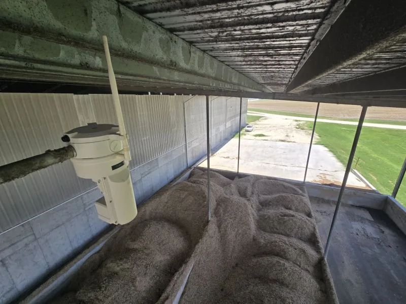 EOS2 LiDAR sensor mounted on a pipe arm above a feed commodity bay