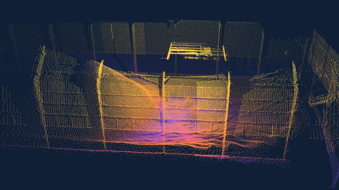 EOS2 point cloud of a stockpile inside a storage bay, colored by height