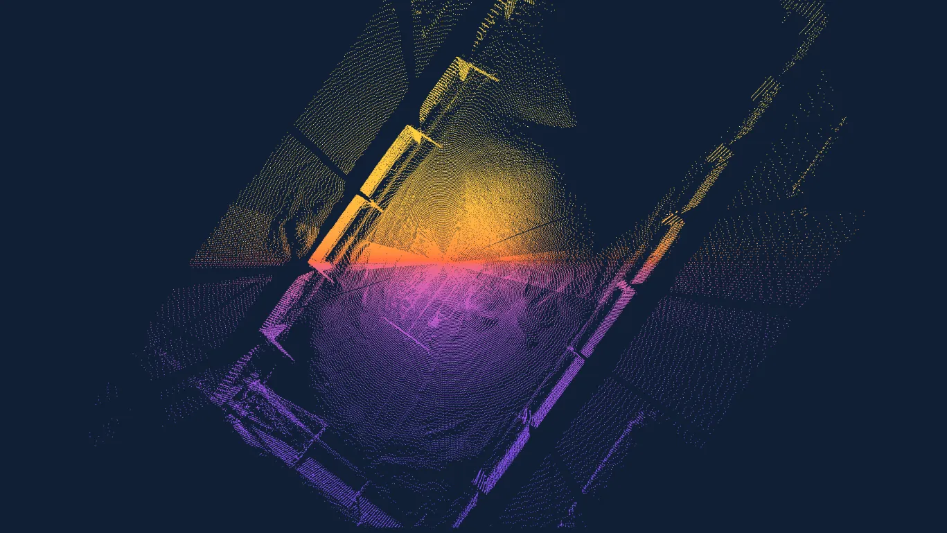 Top-down EOS2 point cloud of a stockpile in a storage bay, colored by height