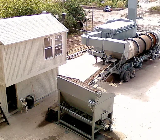 Soil reclamation unit with a rotary drum, feed hopper and control building at the Clean Earth facility in Moore Haven, Florida, where STACguard is installed